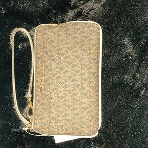 Michael Kors wristlet in powder blush